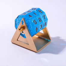 Blue acryllic spinnable life counter with gold stand on a white background
