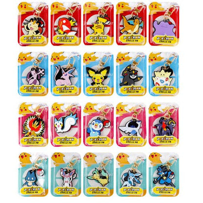 Collection of various Pokémon keychains on display